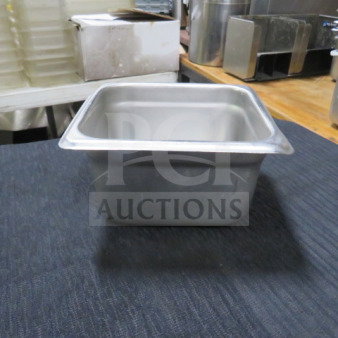 1/6 size hotel pan, 4-inch deep. Stainless steel, used condition. Ideal for commercial kitchen use. Model 5XBID.