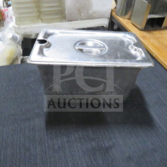 1/4 size, 6-inch deep stainless steel hotel pan with lid. Slightly used condition. Ideal for food service or catering.