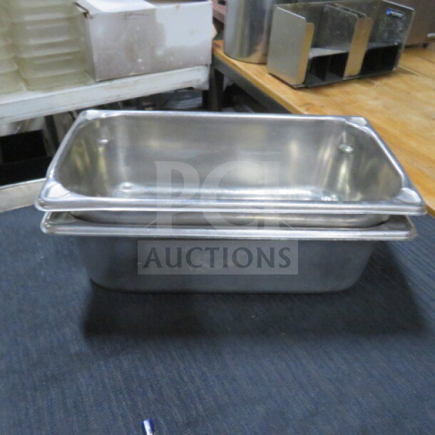1/3 Size 4 Inch Deep Hotel Pan, stainless steel, lightly used, stackable design, ideal for commercial kitchen use.