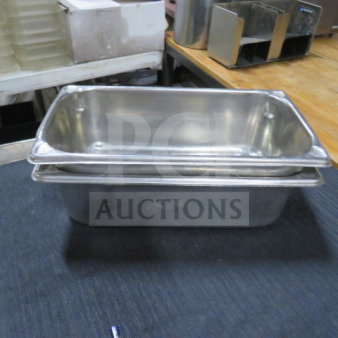 1/3 size, 4-inch deep stainless steel hotel pans; stackable, durable with smooth finish, ideal for commercial kitchen use.