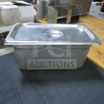 1/3 size, 6-inch deep hotel pan with lid, stainless steel, gently used. Ideal for food service. Model: 3XBID.