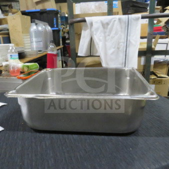1/2 Size 6 Inch Deep Hotel Pan, stainless steel, used condition, suitable for catering or restaurant use.
