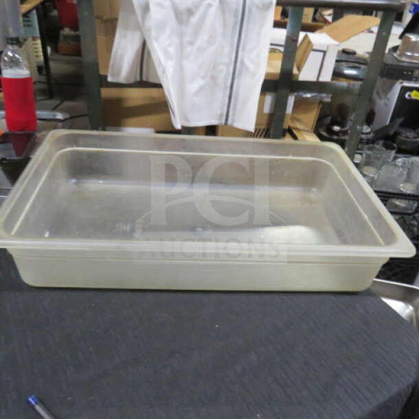 Full size 4-inch deep food storage container, transparent, rectangular, durable plastic, marked "5XBID," used condition.