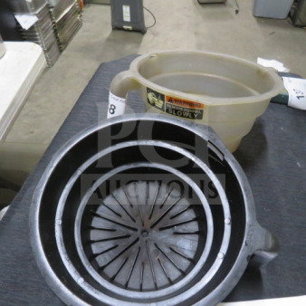 Filter Basket 2XBID, two-piece set. Includes a black inner basket and translucent outer container. Used condition.