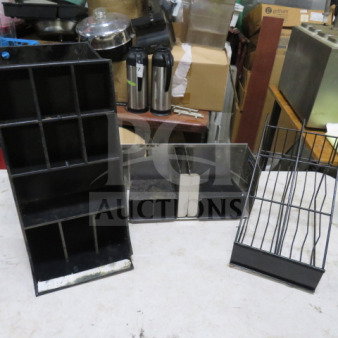 Assorted holders, three types: metal and plastic, varying sizes and compartments, used condition, suitable for organizing.