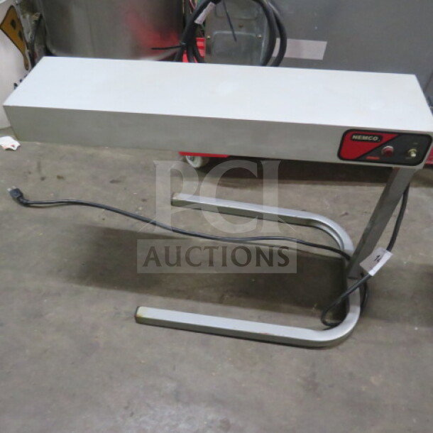 Nemco food warmer, model 6152-24, 120 Volt. Rectangular design, sturdy stand, visible power cord, used condition.