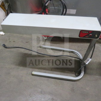 Nemco food warmer, model 6152-24, 120 Volt. Rectangular design, sturdy stand, visible power cord, used condition.
