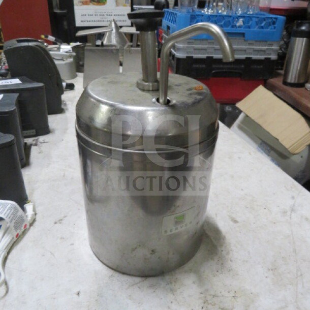 One SS Server Warmer with Pump, stainless steel, pre-owned, minor wear, includes dispensing pump, suitable for liquid heating.