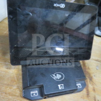 NCR POS Terminal with touchscreen, used condition. Missing cords. Features contactless payment symbol on base.