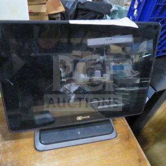 NCR POS terminal without cords, display screen, used condition, NCR logo visible on the bezel.