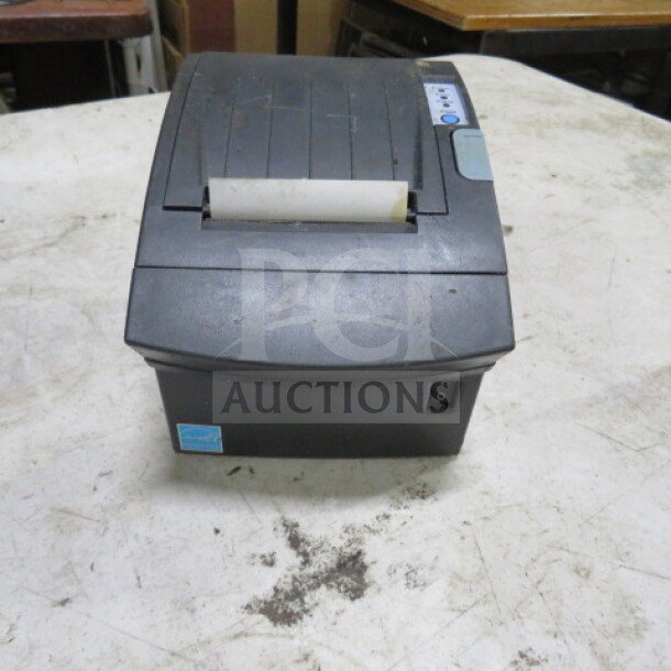 Bixolon thermal printer in used condition, visible buttons and paper slot on top, power switch on side.
