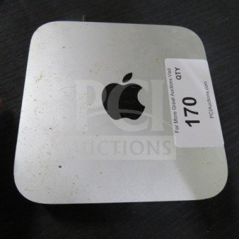 Apple Mac Mini with visible signs of wear. Auction tag "170 QTY" indicating lot number.