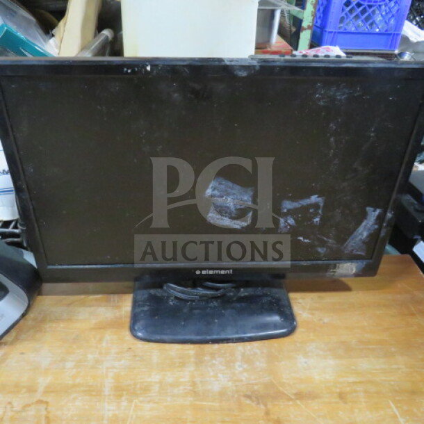 Element flatscreen TV, model ELEFW195, with visible surface wear.