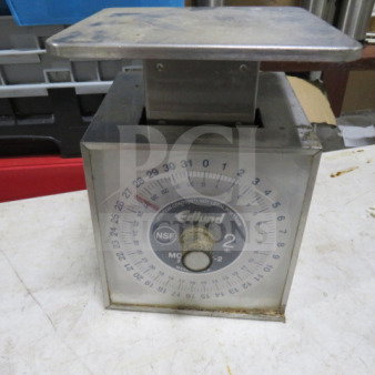 Edlund SR-2 scale with stainless steel platform, visible markings, and dial. Used condition with some surface wear.