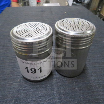 Stainless steel dredge shakers, set of two, perforated lids, item tag 191 visible, used condition.