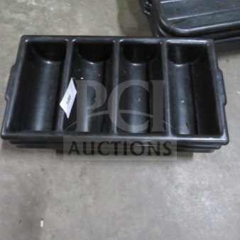 Black plastic flatware holder with four compartments, used condition, labeled with item number.