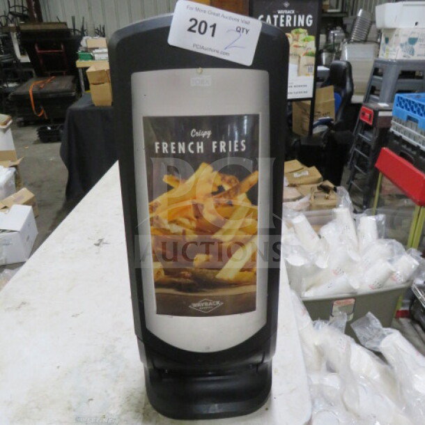 Tork Tabletop Napkin Dispenser, model 2XBID, showcasing a "Crispy French Fries" image. Used, in good condition.