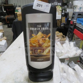 Tork Tabletop Napkin Dispenser, model 2XBID, showcasing a "Crispy French Fries" image. Used, in good condition.