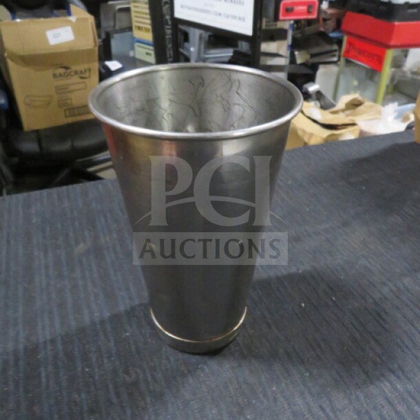 One stainless steel mixing glass, part of a lot of 25, in good condition with a brushed finish, no visible markings.