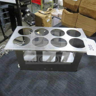Stainless steel cone holder with eight slots, rectangular design, used condition, item tag number 208 visible.