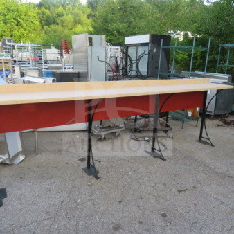 Stand-alone laminate bar with four metal bases, measuring 138x19x45 inches. Good condition, red paneling, sturdy construction.