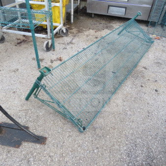 One green Metro shelf with two wall mount brackets, 72x18 inches. Sturdy wire construction, suitable for heavy storage.