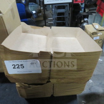 Stack of flat, brown paper boxes with label "225 QTY." Boxes appear unused and neatly stacked.