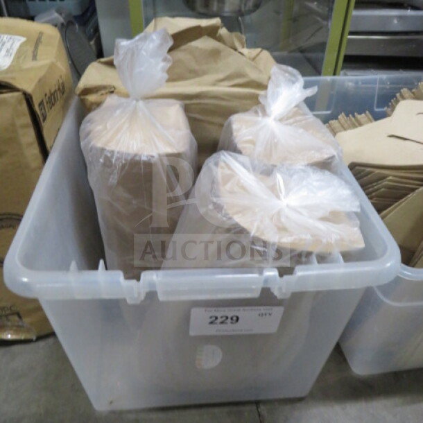 Plastic bin containing a lot of to-go items, including stacked paper bags wrapped in plastic. Labeled "229".