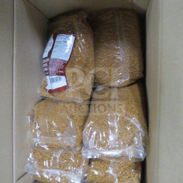 A case of packaged cookie crumbles in clear bags, labeled with nutritional info. Items appear new and unopened.