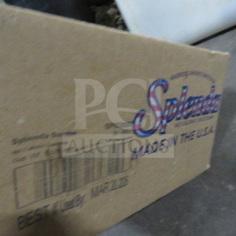 Opened case of Splenda sweetener with bold logo and "Made in the USA" marking; barcode and "Best By: Mar 21, 2026" label visible.