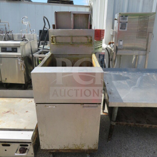 Dean Natural Gas Deep Fryer on casters, Model SR162GN. Dimensions 20x33x47. Used condition, visible wear on surface.