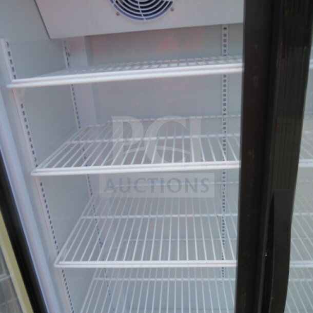 Two-door glass display cooler, Model LC600K-BK, with four adjustable shelves, dimensions 38x21x72.5 inches.
