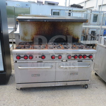 Motak MR10-C-S natural gas 10-burner range, stainless steel with over shelf, on casters, 60x33x60, used condition.
