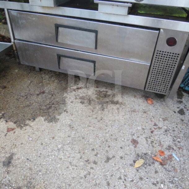 True 2 Drawer Chef Base on casters, Model TRCB-52-60, 115V, 60x32x26 inches. Stainless steel finish, used condition.