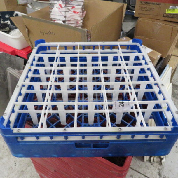Blue dishwasher rack with 25 compartments, square grid design, sturdy plastic frame, used condition. Ideal for commercial use.