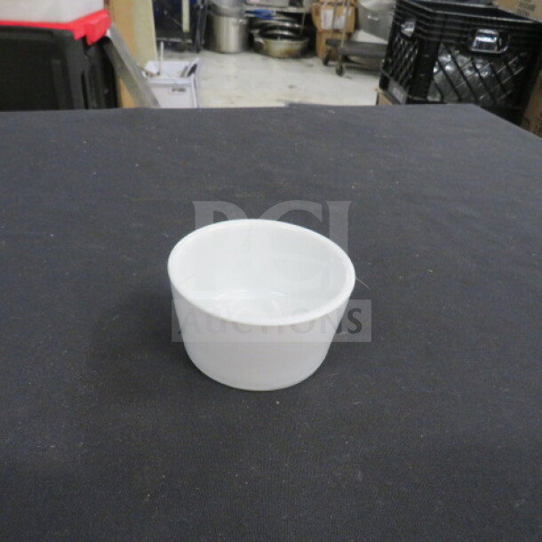 NEW CAC 6oz ramekin, model RKF-6-P, pristine condition, white ceramic, ideal for sauces or desserts.