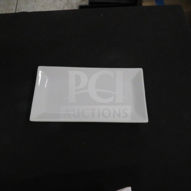 NEW CAC 8.5-inch rectangular plate, model KSE-34, pristine condition, smooth white finish.