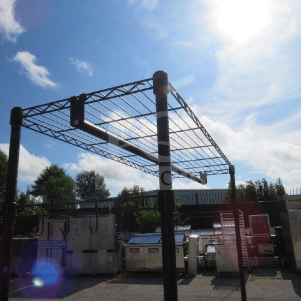 Black Metro shelf unit with 3 shelves, coat rack, and hooks. Features casters for mobility. Dimensions: 47x18x75 inches.