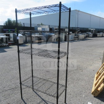 Black Metro shelf with 4 wire shelves, 36x16x73 inches. Sturdy metal construction, ideal for storage and display.