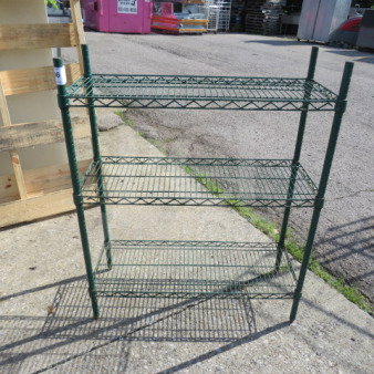 Green Metro shelf unit with three wire shelves, 36x14x44 inches. Sturdy metal construction in good condition.