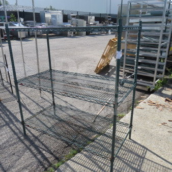 Green Metro shelf unit with 3 wire shelves, dimensions 48x24x52 inches, outdoor condition, visible brand marking.