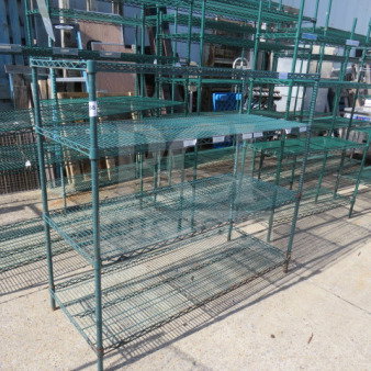 Green Metro shelf with 4 wire shelves, size 60x24x54.5 inches, used condition, ideal for storage and organization.