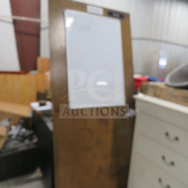 One 36x83.5 wooden door with handle, featuring a center white panel, in used condition.