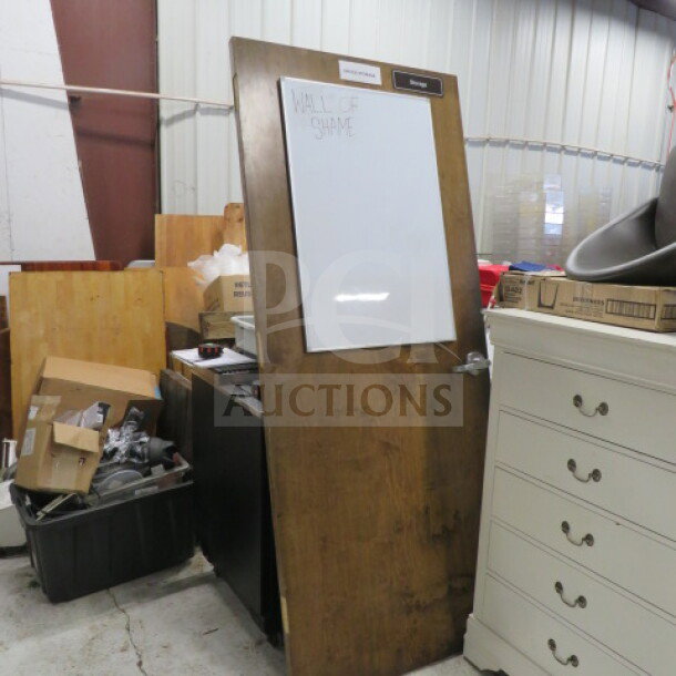 Wooden door with handle, 36x83.5 inches, features attached whiteboard. Condition: used. Ideal for office or classroom use.