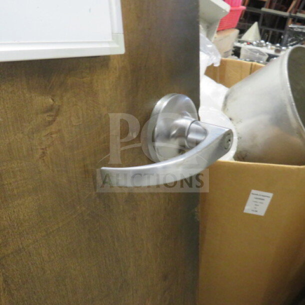 One wooden door, 36x83.5 inches, with a modern silver handle. Appears in good condition.