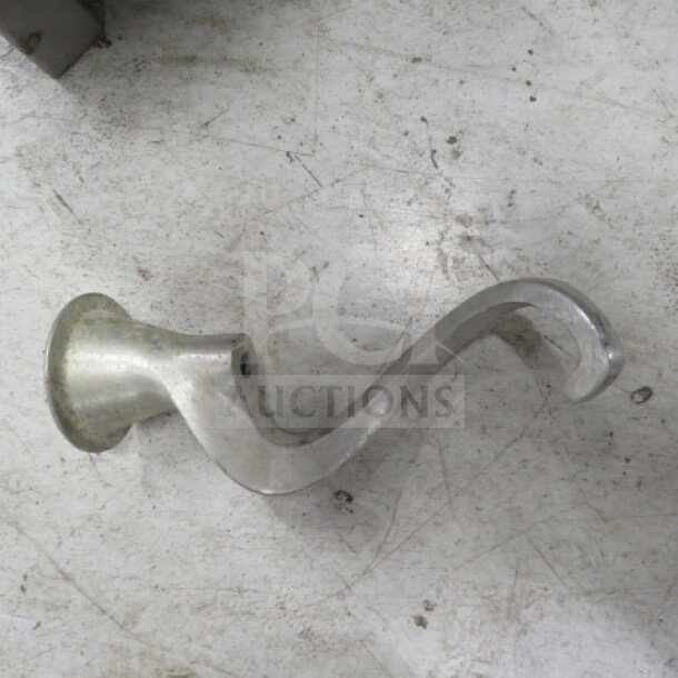 Stainless steel 20 quart hook with a curved design, used condition, minor surface wear evident, suitable for industrial mixers.