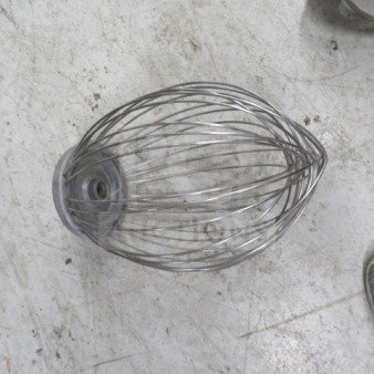 Stainless steel 20-quart whip attachment for a commercial mixer, in good condition, with sturdy wire construction.