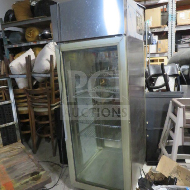 Delfield 1 Door Pass Thru Glass Display Cooler, Model CSRPT1P-G-I31, 4 Racks, 115V, $14,355, used condition.
