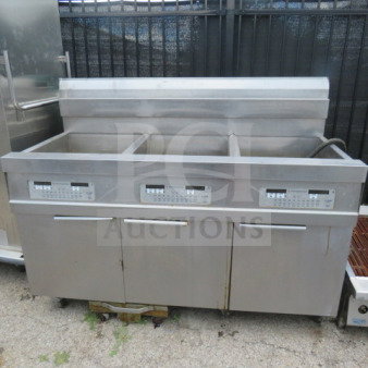 Frymaster 3-bay natural gas fryer, model 31814NFSE, with digital controls and filtration, on casters. Measures 60x33.5x48 inches.