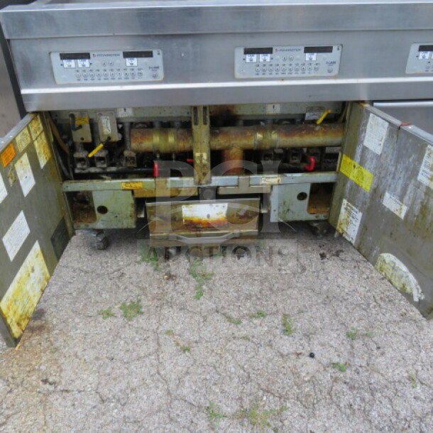 Frymaster 3-bay gas fryer system, model 31814NFSE, with digital controls, filtration, on casters, 60x33.5x48 inches.